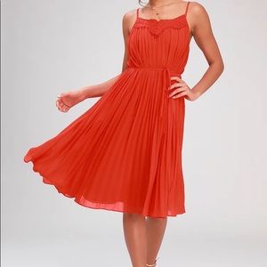 In Celebration Red Orange Pleated Midi Dress